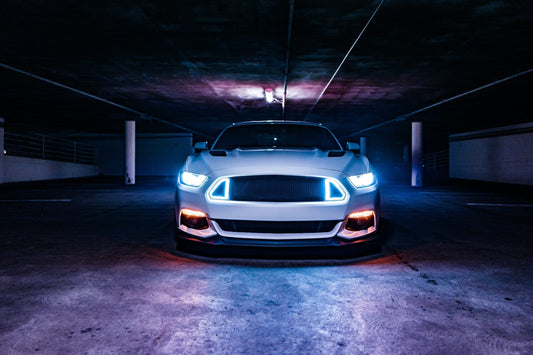 Car with premium aftermarket LED headlights and taillights installed, enhancing visibility and modern style upgrade